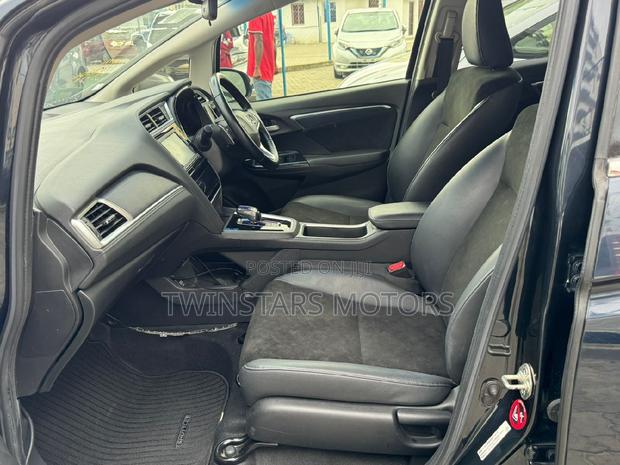 2018 Honda Shuttle Blue 1.5L Hybrid: Spacious and Fuel-Efficient Honda Shuttle