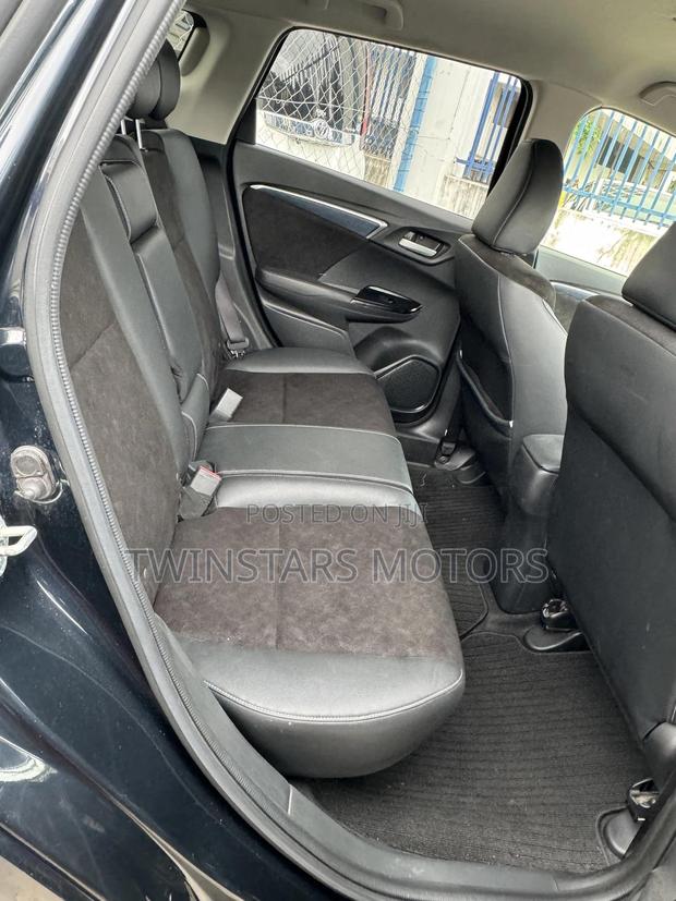 2018 Honda Shuttle Blue 1.5L Hybrid: Spacious and Fuel-Efficient Honda Shuttle