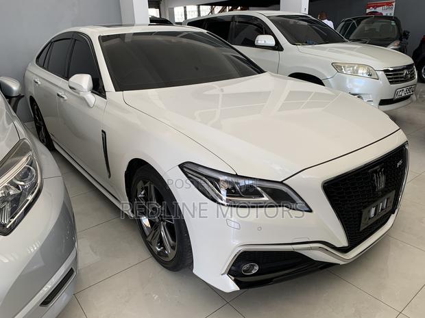 2018 Toyota Crown White - White Sedan with Power and Style