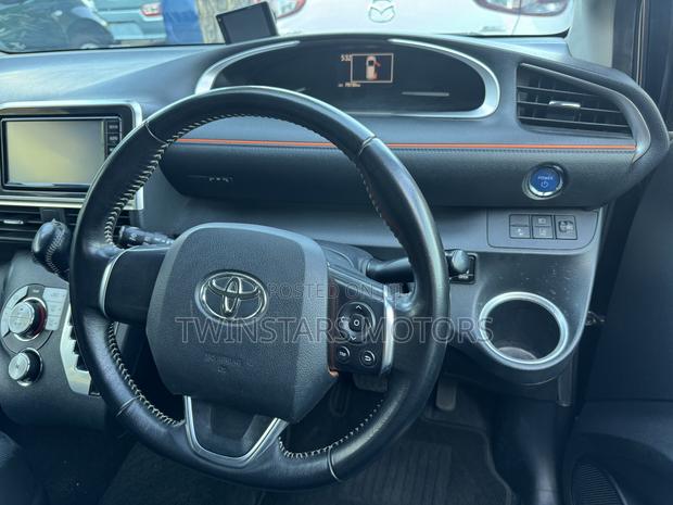 Brown 2018 Toyota Sienta 1.5 Hybrid FWD: Comfortable, Economical, and Modern