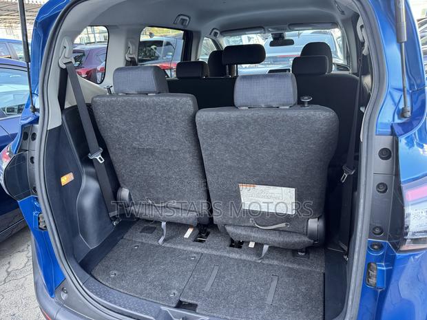 Toyota Sienta 1.5 Hybrid FWD 2018 - Blue: Eco-friendly, Spacious, and Stylish
