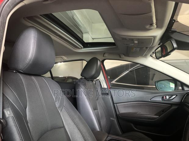 2017 Mazda Axela Red Hatchback Advertisement