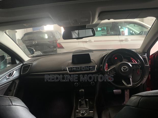 2017 Mazda Axela Red Hatchback Advertisement