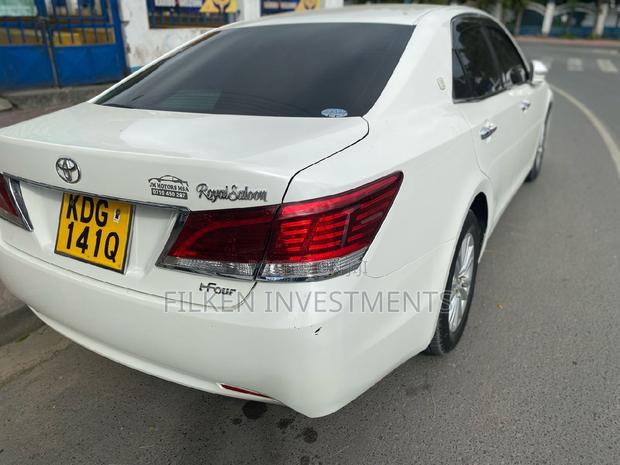 White 2016 Toyota Crown - Classic Used Luxury Sedan