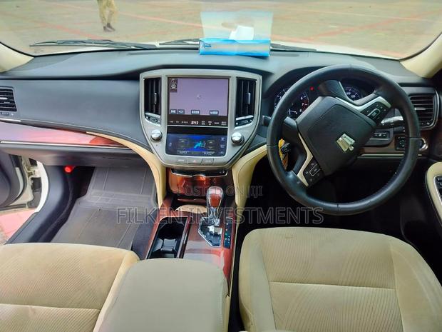 White 2016 Toyota Crown - Classic Used Luxury Sedan