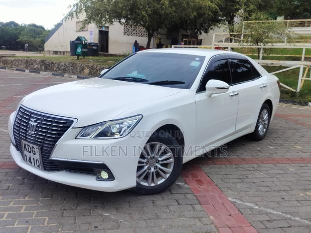 White 2016 Toyota Crown - Classic Used Luxury Sedan