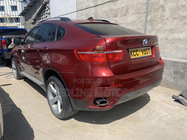 BMW X6 2008 Red Sports Activity Coupe - High-Performance and Sophisticated