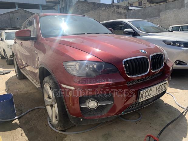 BMW X6 2008 Red Sports Activity Coupe - High-Performance and Sophisticated