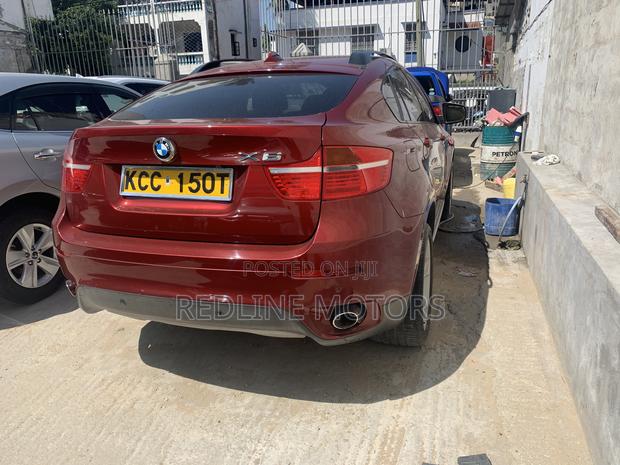 BMW X6 2008 Red Sports Activity Coupe - High-Performance and Sophisticated