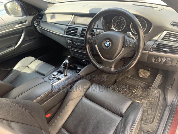 BMW X6 2008 Red Sports Activity Coupe - High-Performance and Sophisticated