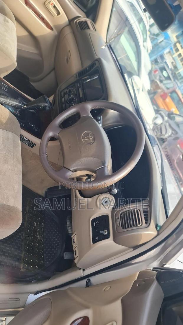 Gray 2004 Toyota Land Cruiser - Affordable 4x4 SUV Available