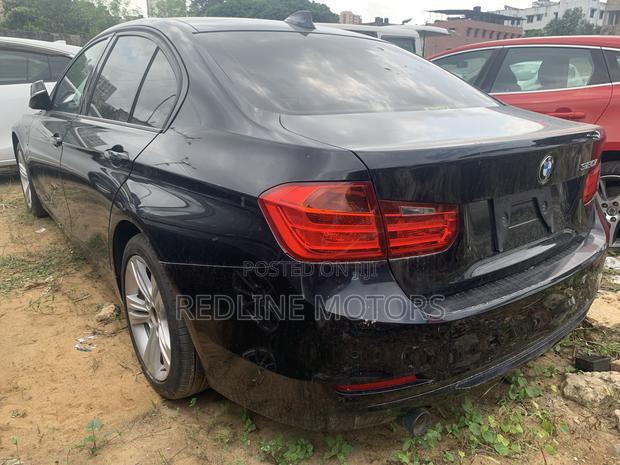 2017 Black BMW 320i Sedan with Rear-Wheel Drive