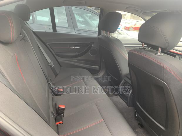 2017 Black BMW 320i Sedan with Rear-Wheel Drive