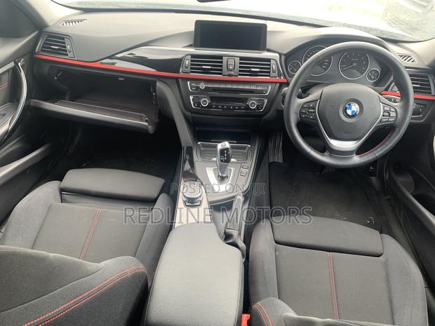 2017 Black BMW 320i Sedan with Rear-Wheel Drive