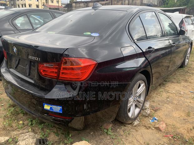 2017 Black BMW 320i Sedan with Rear-Wheel Drive