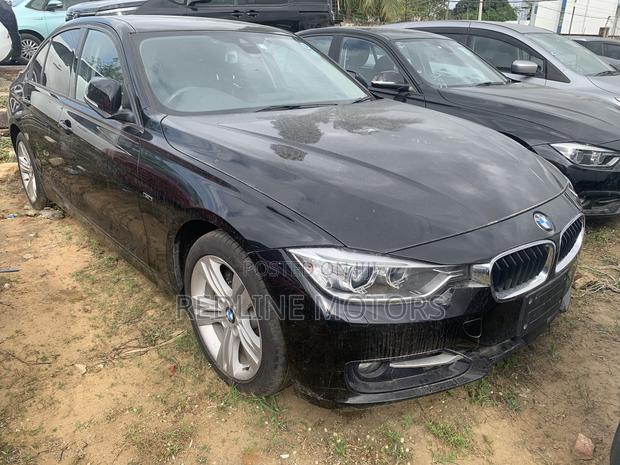 2017 Black BMW 320i Sedan with Rear-Wheel Drive