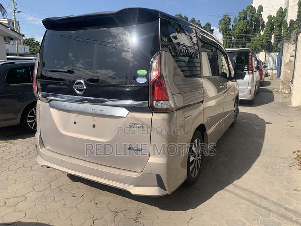 Quality Nissan Serena 2017 Gold - Reliable and Efficient Minivan