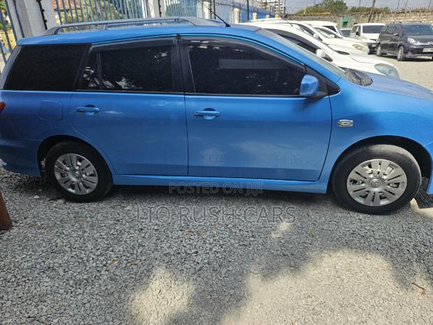 2015 Blue Wingroad Nissan - Minivan for Sale with Modern Features and Comfort