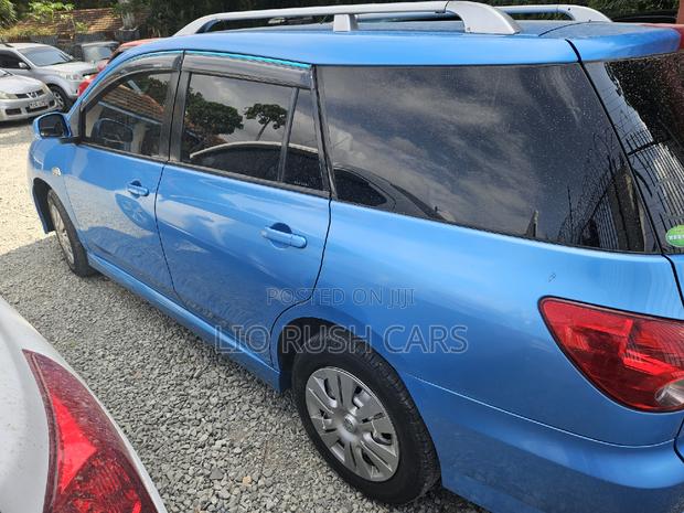 2015 Blue Wingroad Nissan - Minivan for Sale with Modern Features and Comfort