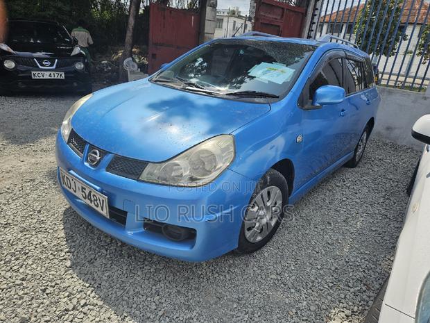 2015 Blue Wingroad Nissan - Minivan for Sale with Modern Features and Comfort