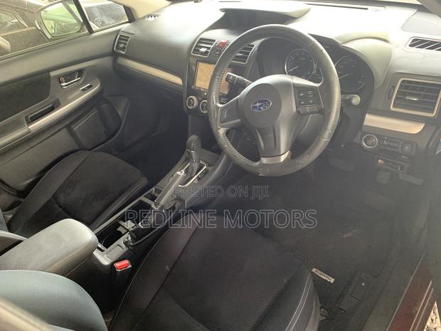 2016 Subaru Impreza Red - Premium Pre-owned Hatchback
