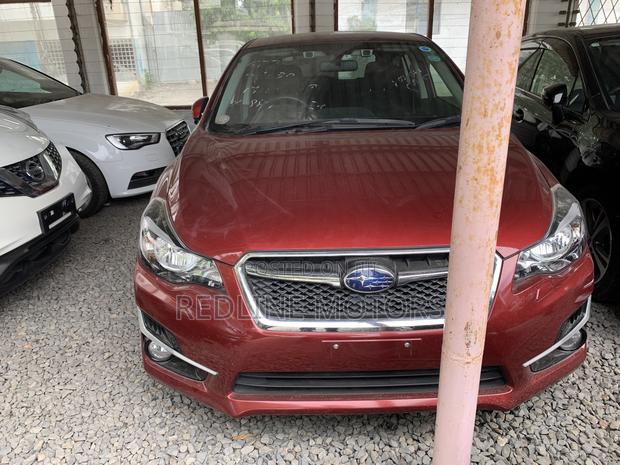 2016 Subaru Impreza Red - Premium Pre-owned Hatchback