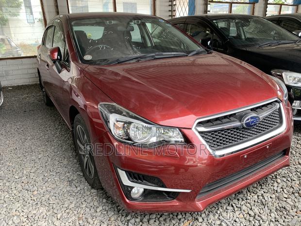 2016 Subaru Impreza Red - Premium Pre-owned Hatchback