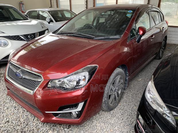 2016 Subaru Impreza Red - Premium Pre-owned Hatchback
