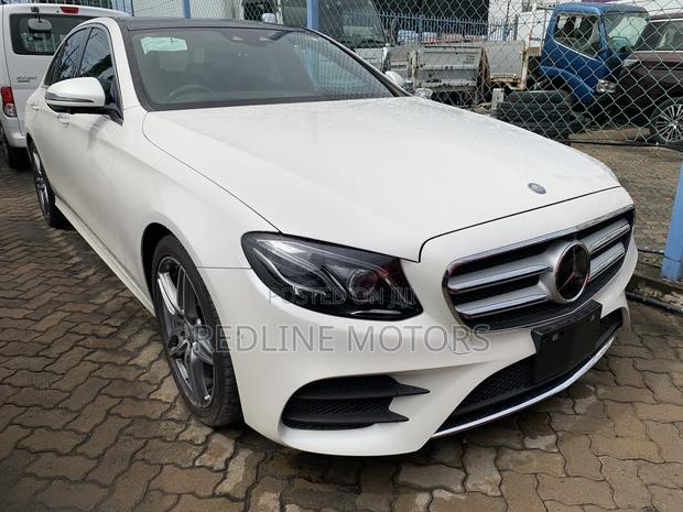 Off-White 2016 Mercedes-Benz E200 Executive Sedan