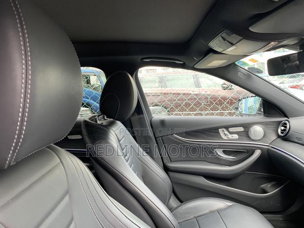 Off-White 2016 Mercedes-Benz E200 Executive Sedan