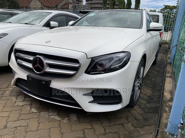 Off-White 2016 Mercedes-Benz E200 Executive Sedan