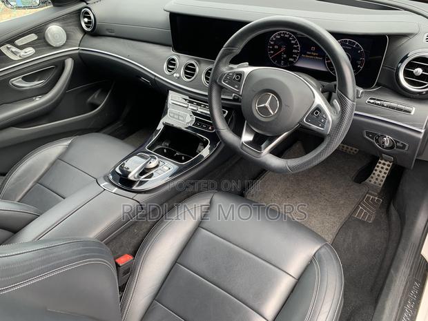 Off-White 2016 Mercedes-Benz E200 Executive Sedan