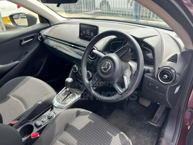 Mazda Demio 2017 in Brown - Compact Car for Comfortable Journeys