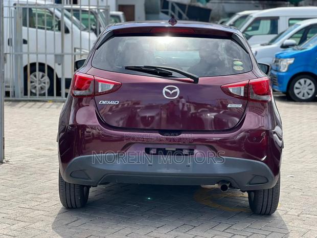 Mazda Demio 2017 in Brown - Compact Car for Comfortable Journeys