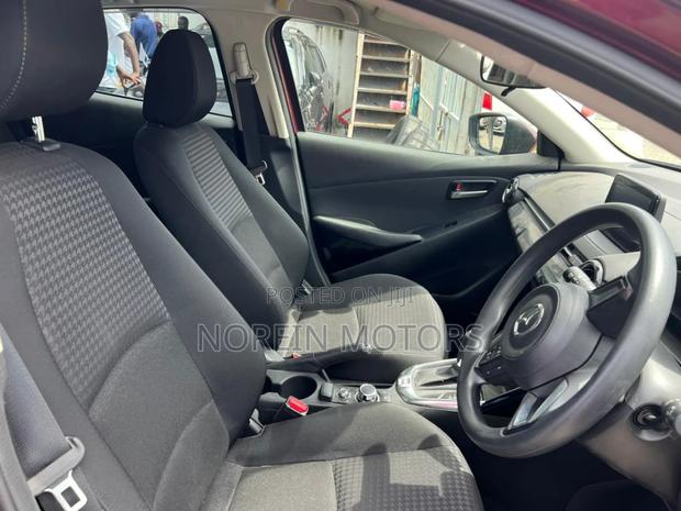 Mazda Demio 2017 in Brown - Compact Car for Comfortable Journeys