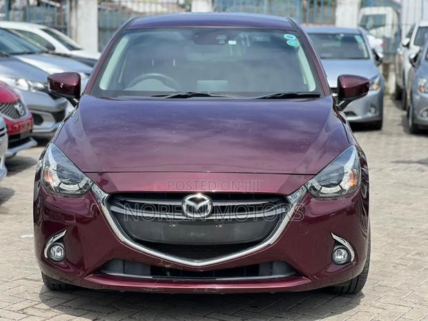 Mazda Demio 2017 in Brown - Compact Car for Comfortable Journeys
