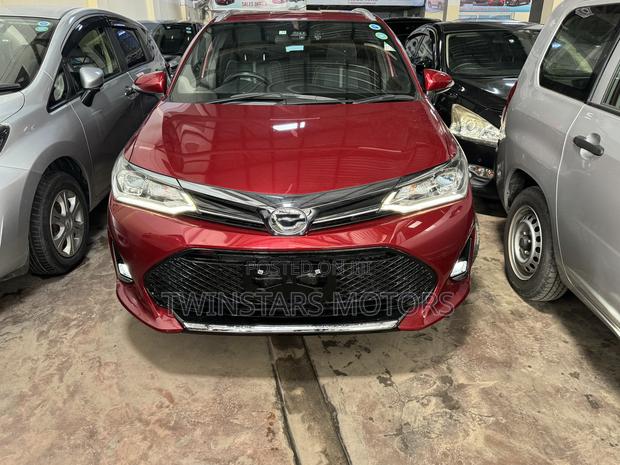 2018 Corolla Fielder in Red Toyota - Luxurious and Afford