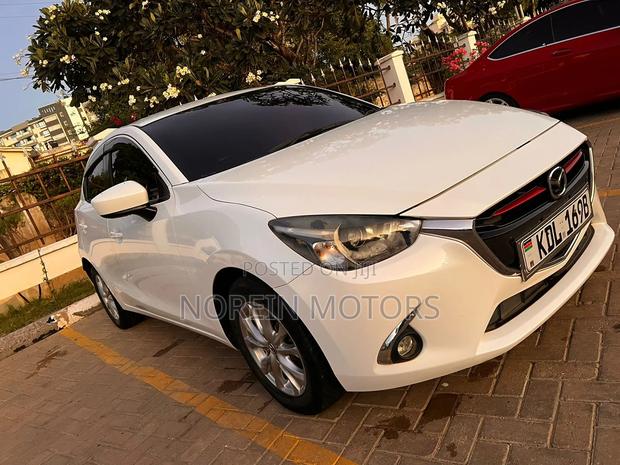 2016 Mazda Demio White: Premium Compact Car with Great Features