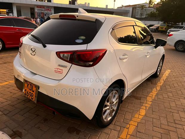 2016 Mazda Demio White: Premium Compact Car with Great Features