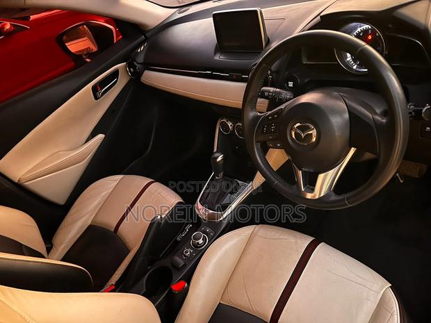 2016 Mazda Demio White: Premium Compact Car with Great Features