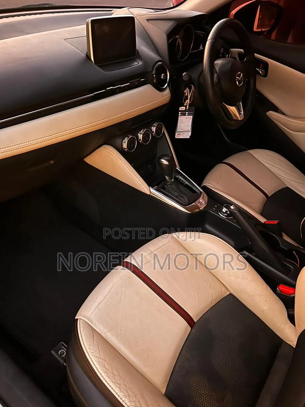 2016 Mazda Demio White: Premium Compact Car with Great Features