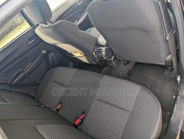 Black Suzuki Swift 2018: Efficient and Affordable Compact Sedan