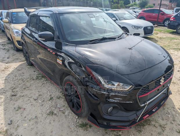 Black Suzuki Swift 2018: Efficient and Affordable Compact Sedan