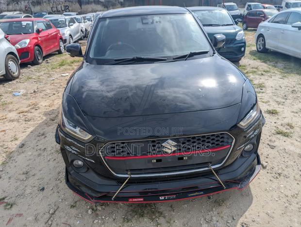 Black Suzuki Swift 2018: Efficient and Affordable Compact Sedan
