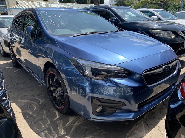 Blue Subaru Impreza 2.0i Sport AWD Hatchback (2017)