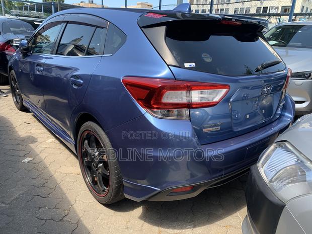Blue Subaru Impreza 2.0i Sport AWD Hatchback (2017)
