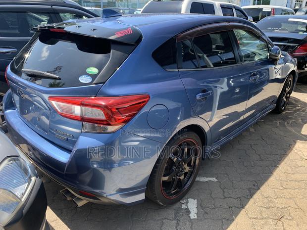 Blue Subaru Impreza 2.0i Sport AWD Hatchback (2017)