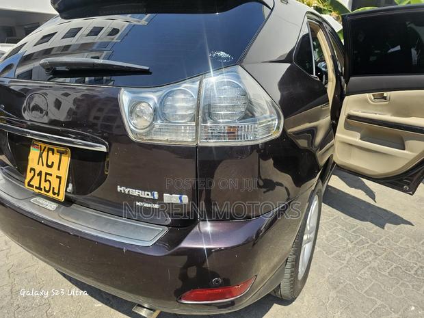 Brown Toyota Harrier 2012: Pre-Owned SUV with Style and Comfort