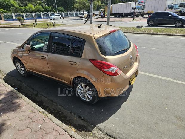 2011 Nissan Tiida Gold - Reliable Sedan with Luxurious Interior
