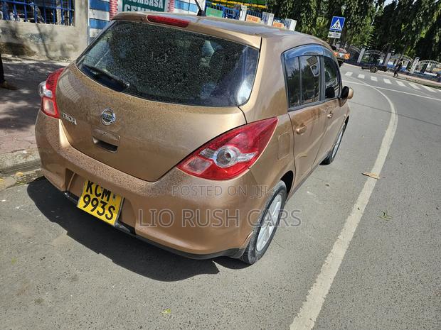 2011 Nissan Tiida Gold - Reliable Sedan with Luxurious Interior